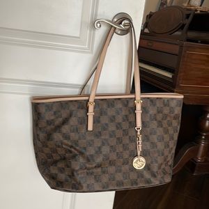 Brown Michael Kors tote bag.